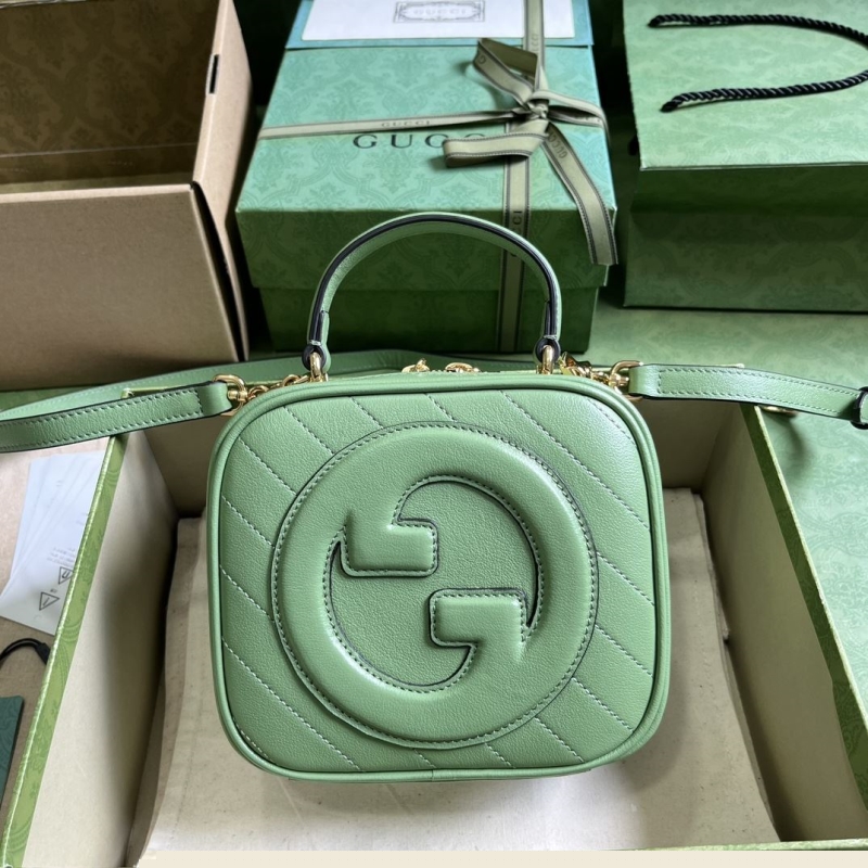 G*u*i top handle bags
